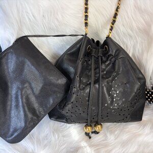 Authentic CHANEL perforated bucket black leather with pouch